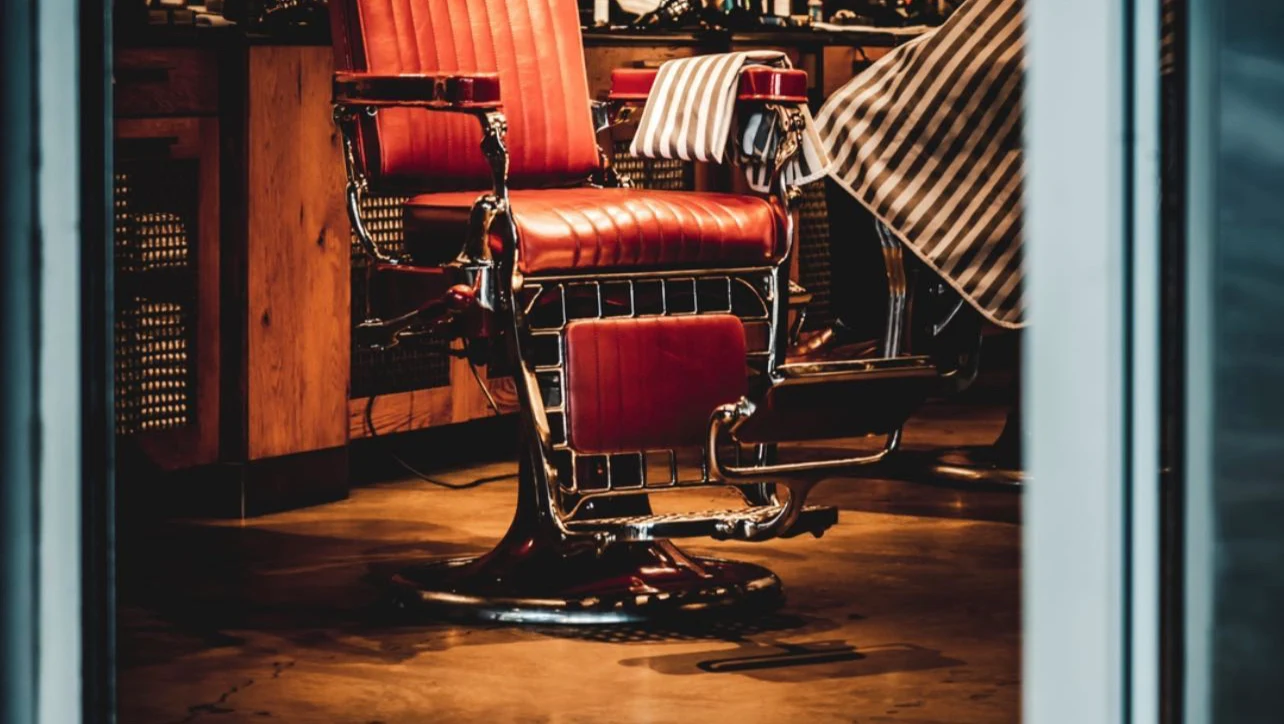 A vintage barber chair inside City Barbers