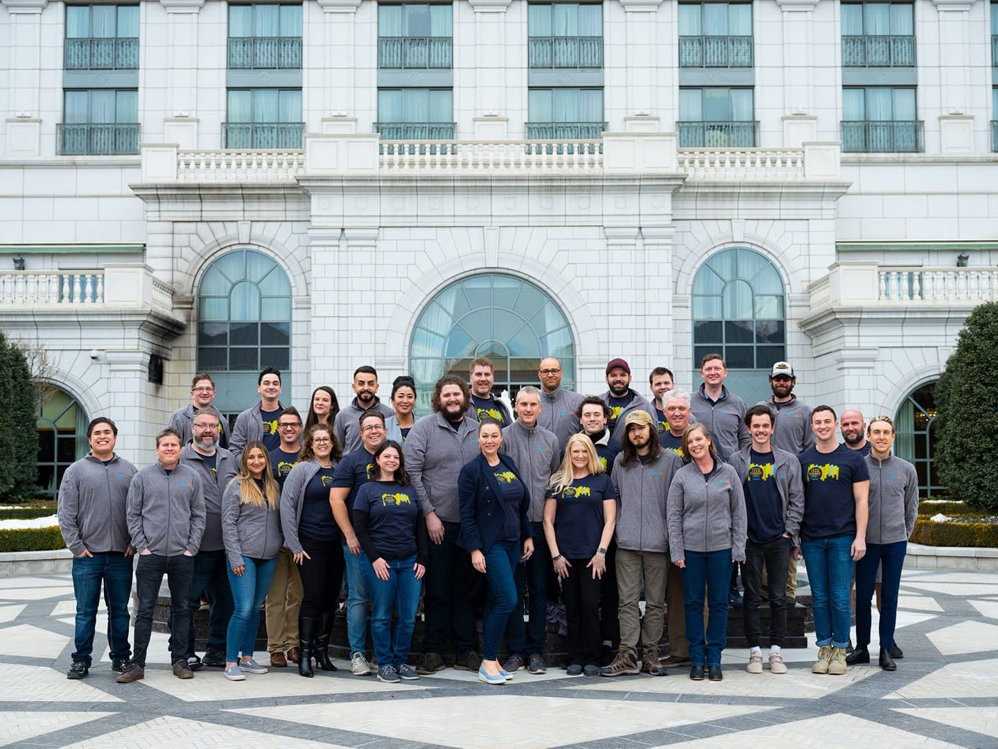 The ConexED team at a summit at the Grand America hotel