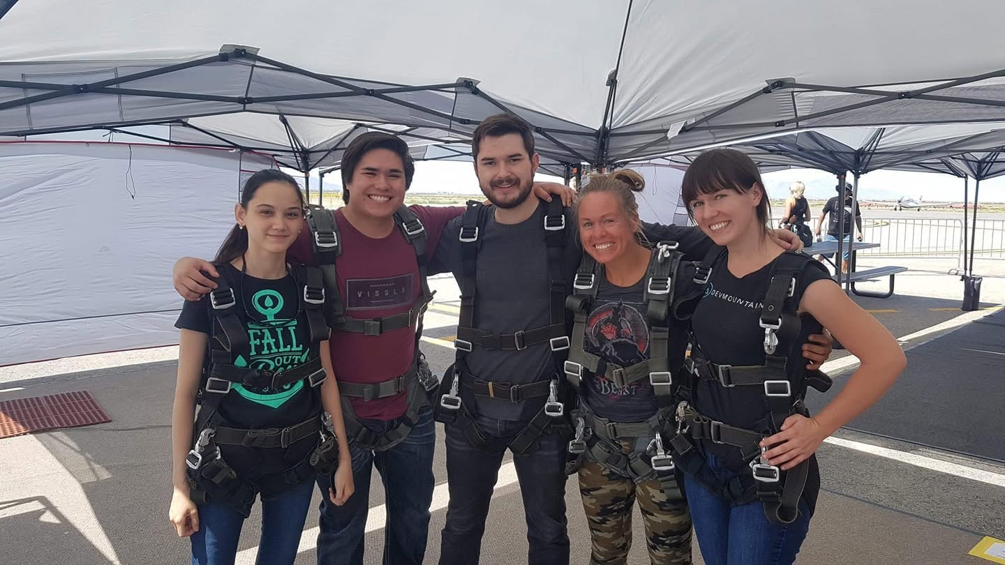 Matthew and the local Legrand QA engineers suited up together before a skydive