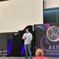 Matthew speaking at a CAST conference session